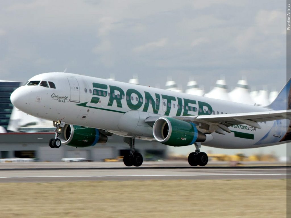 Frontier Airlines plane landing on runway